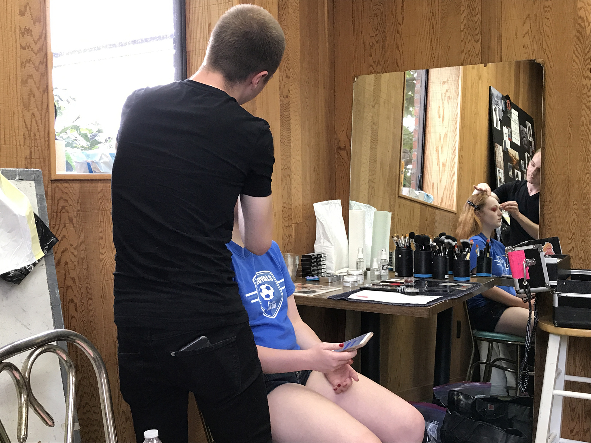 Behind The Scenes: Model in the makeup chair before the show.