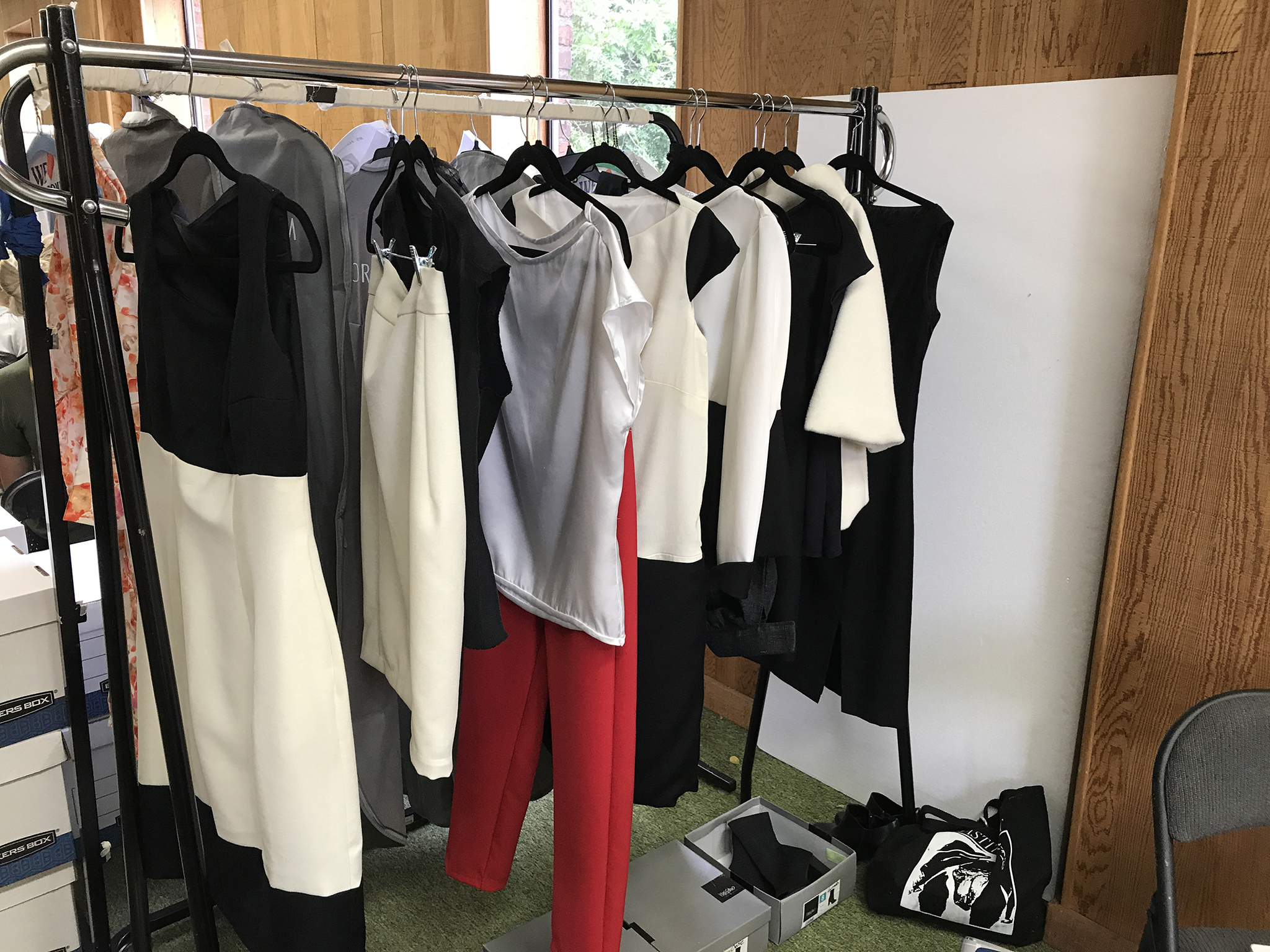 Behind The Scenes: Clothing wrack with fashiong line.