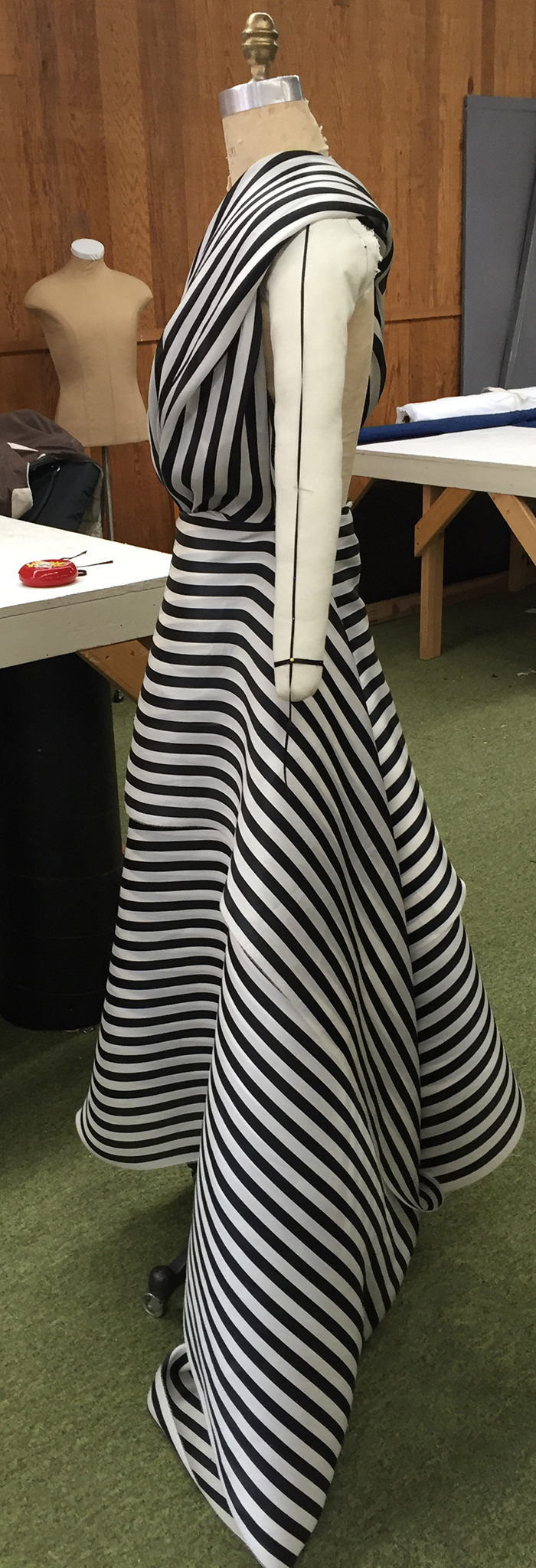 10 yards of continuous black and white silk organza fabric draped over a dress form.