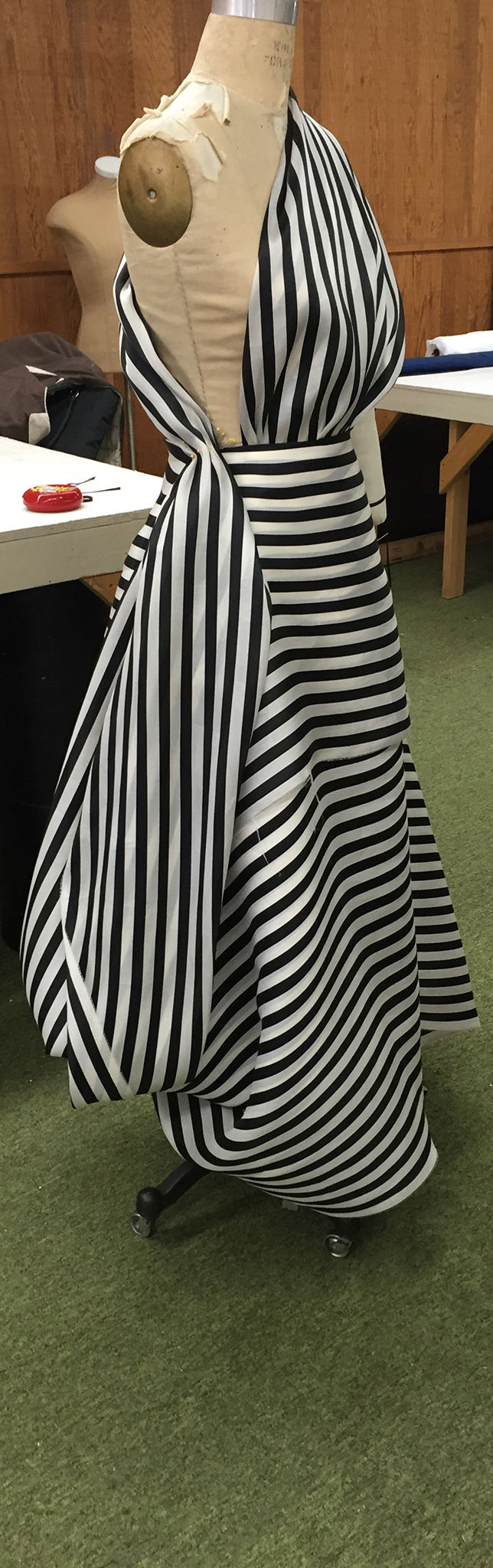 10 yards of continuous black and white silk organza fabric draped over a dress form.