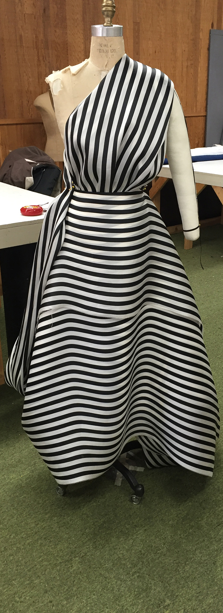 10 yards of continuous black and white silk organza fabric draped over a dress form.